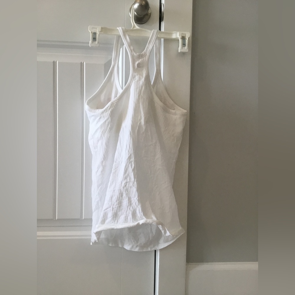 NWOT Lululemon ebb to street tank. Never worn. Size 10.